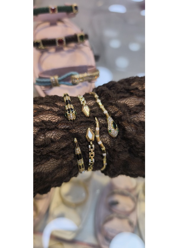 Zirkon taş işlemeli yılanlı çelik kelepçe